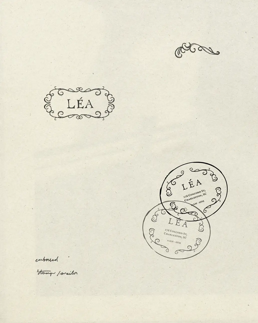 RHEA Creative A page with the word “LÉA” in ornate frames, decorative flourishes, and handwritten notes in the lower left corner. Luxury Branding